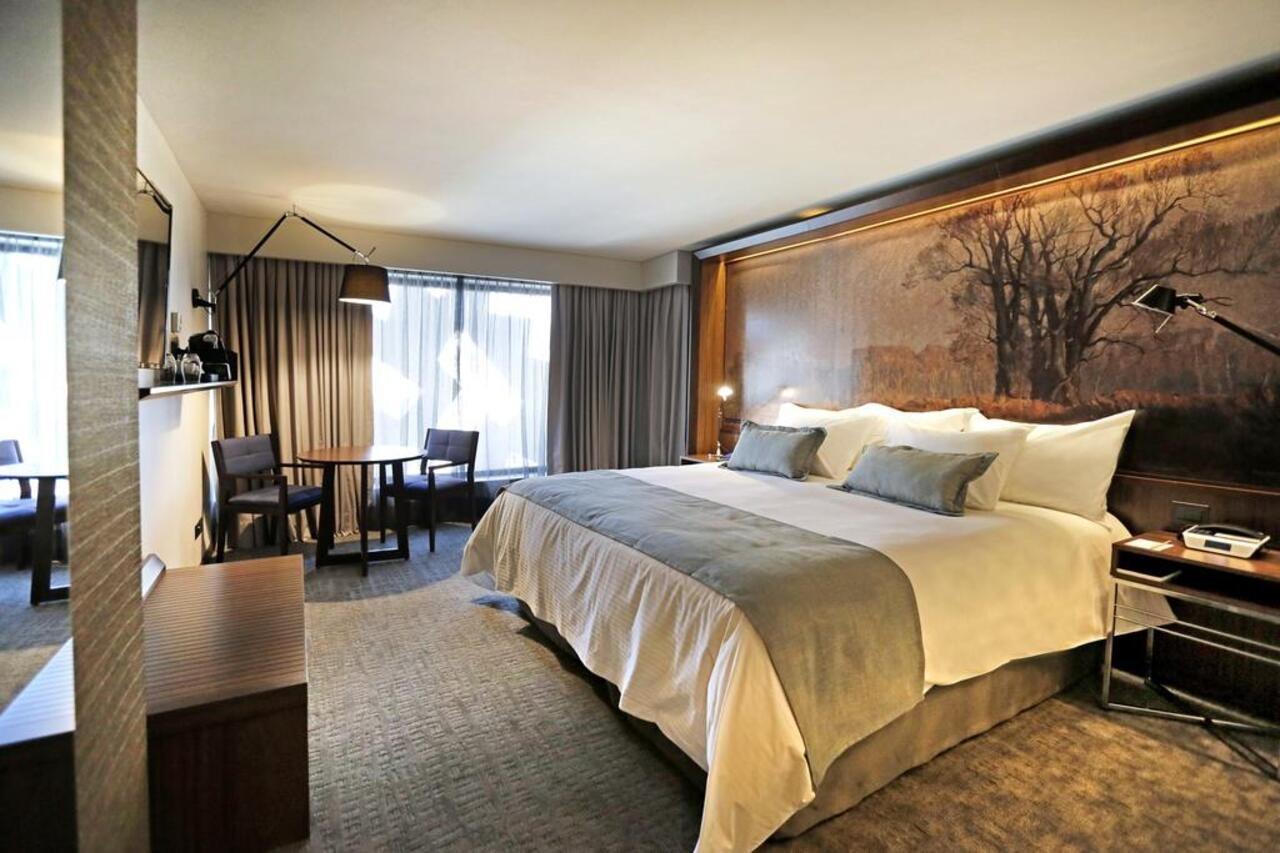 호텔 쿰브레스 라스타리아 산티아고 외부 사진 A room at the hotel