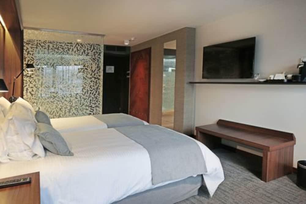 호텔 쿰브레스 라스타리아 산티아고 외부 사진 A room at the hotel
