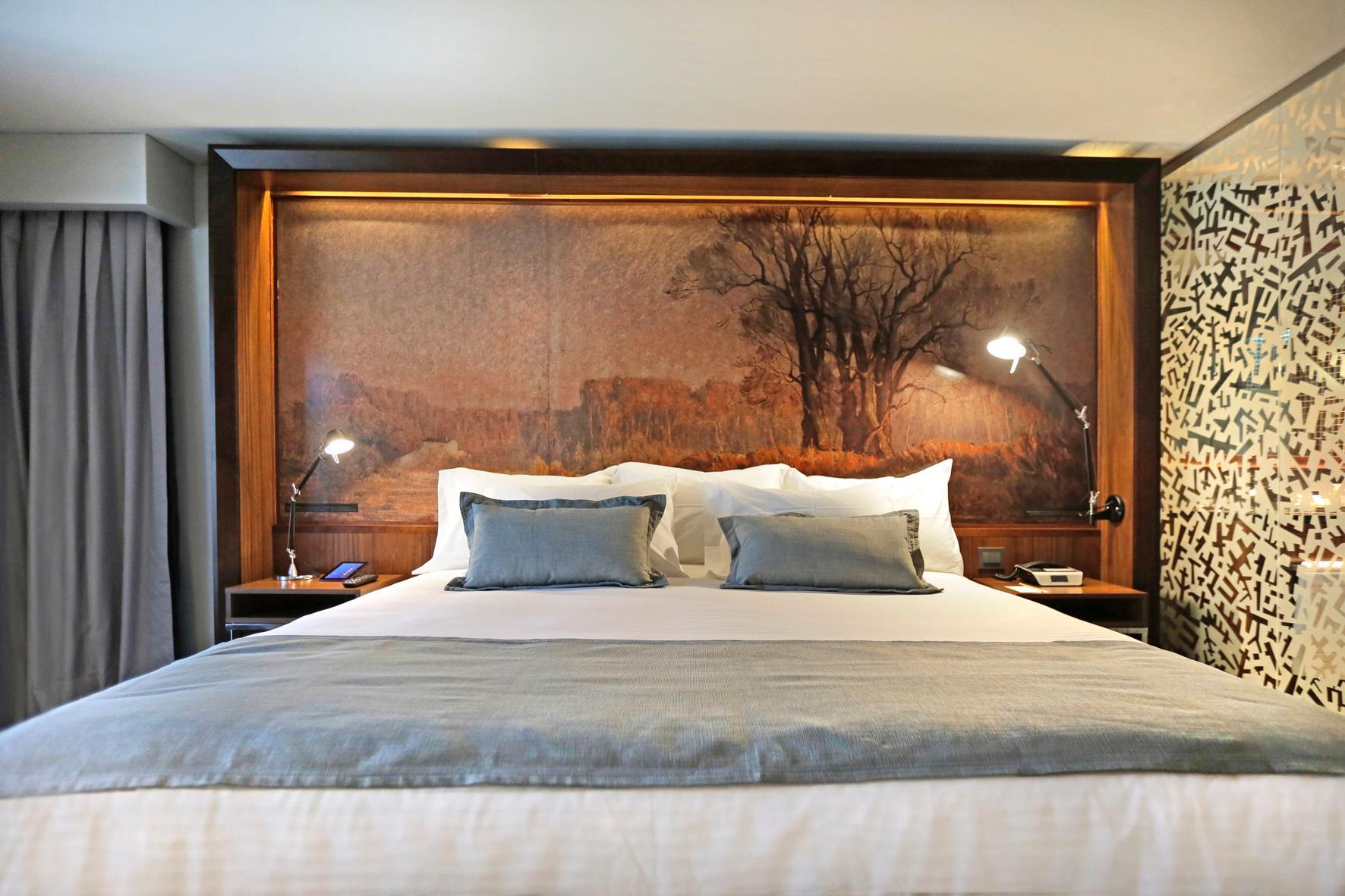 호텔 쿰브레스 라스타리아 산티아고 외부 사진 A bedroom at the hotel