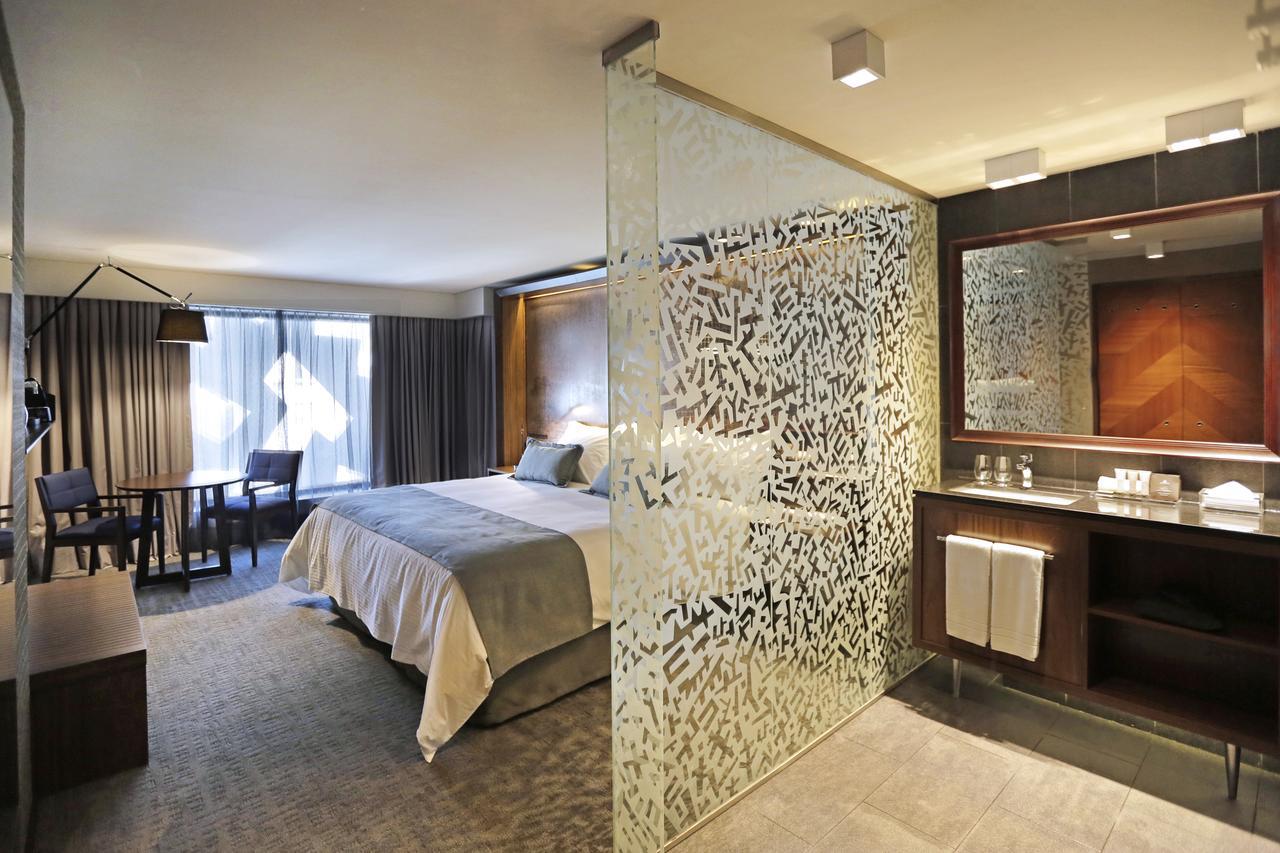 호텔 쿰브레스 라스타리아 산티아고 외부 사진 A room at the hotel